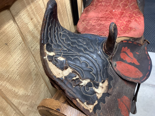 Antique Side Saddle with iron stirrup.