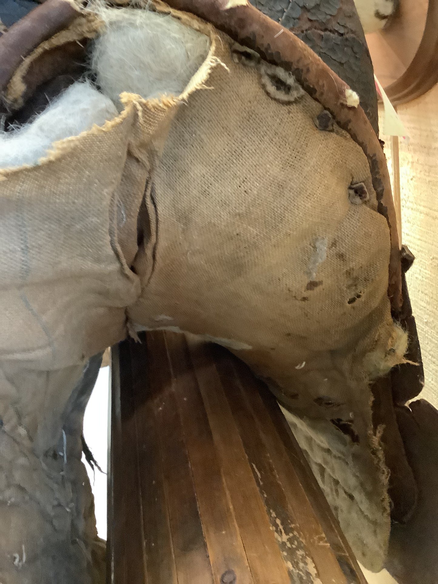 Antique Side Saddle with iron stirrup.