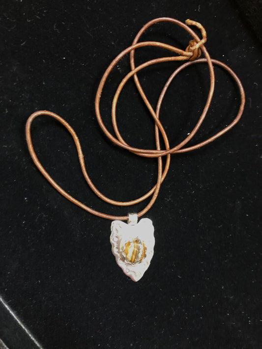 Ronson Page - Hand Made Wooly Mammoth tooth carved gem pendants