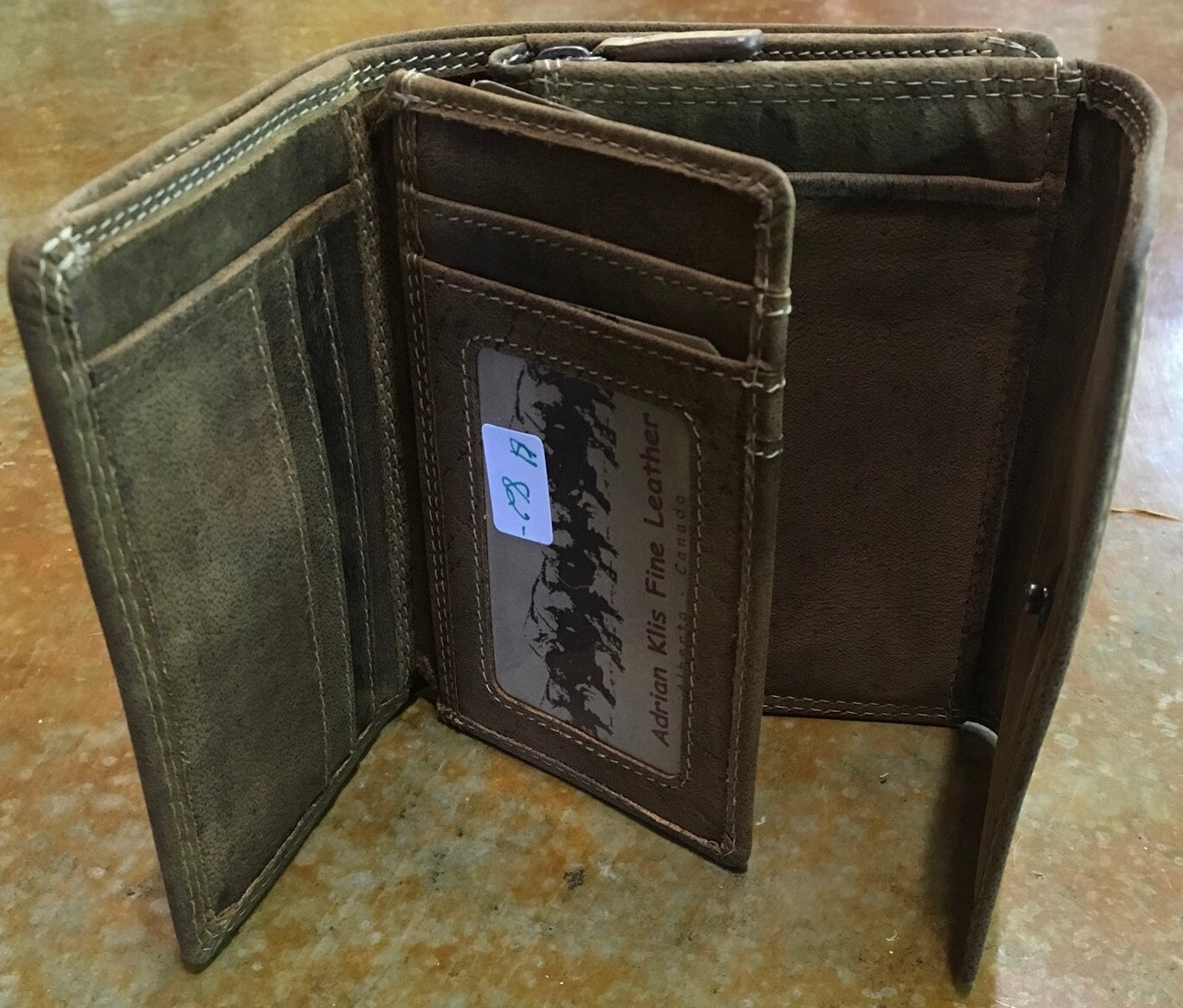 #206 - Adrian Klis zip top 4 fold wallet