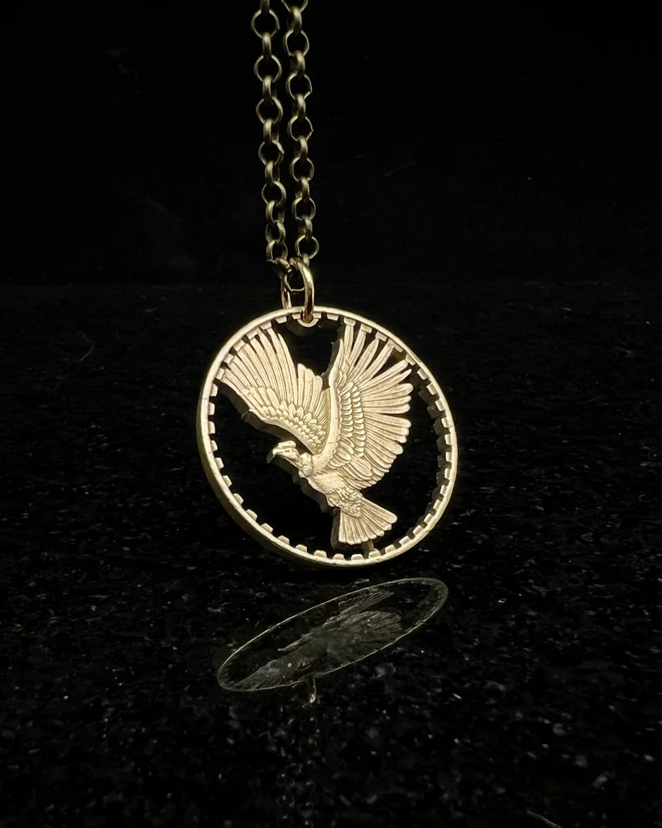 Cut Coin Jewelry from Jarrett Leone in New Hampshire