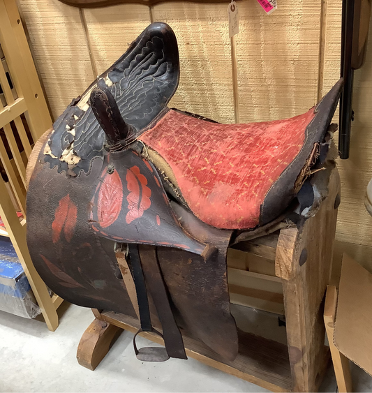 Antique Side Saddle with iron stirrup.