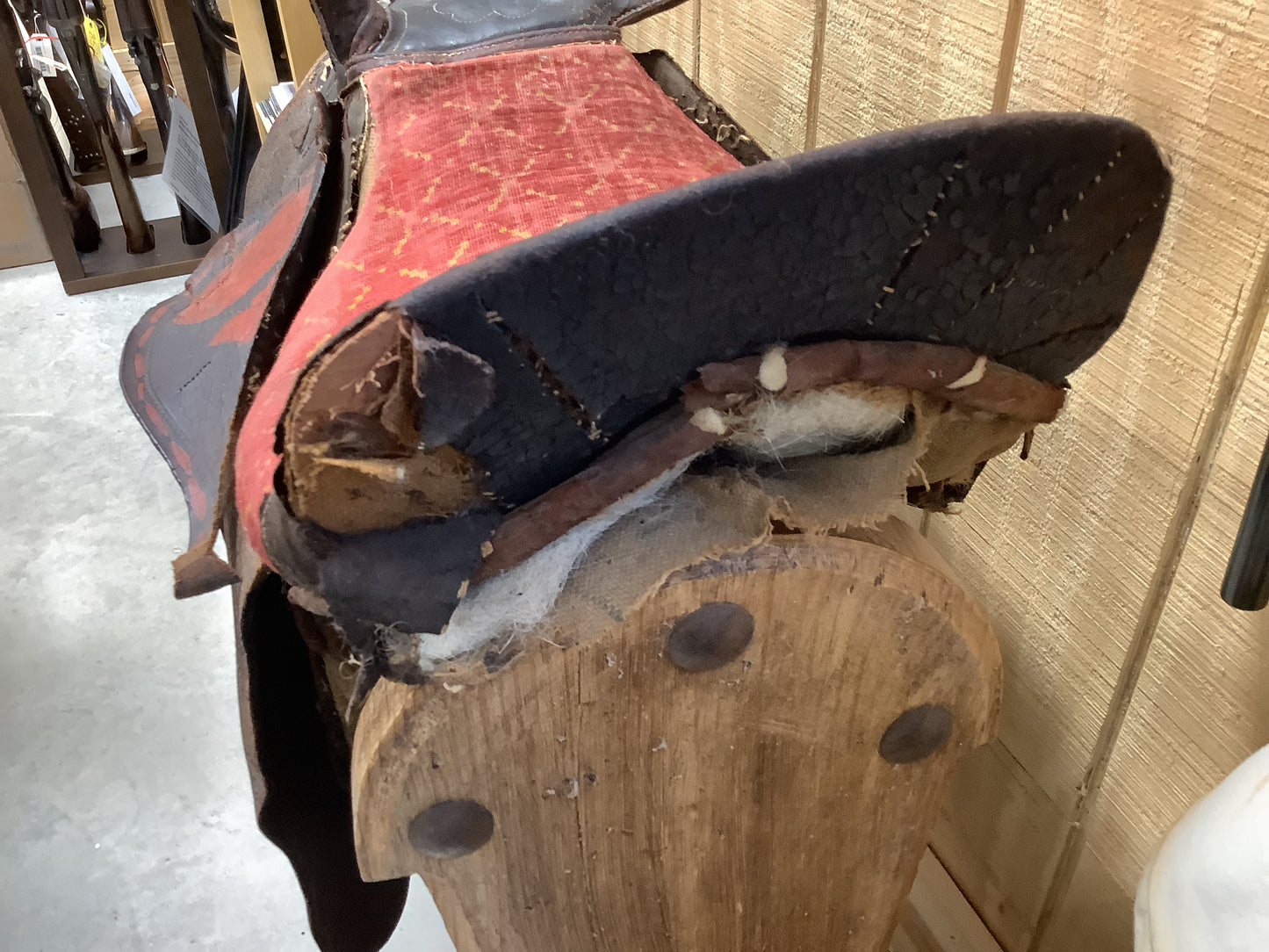 Antique Side Saddle with iron stirrup.