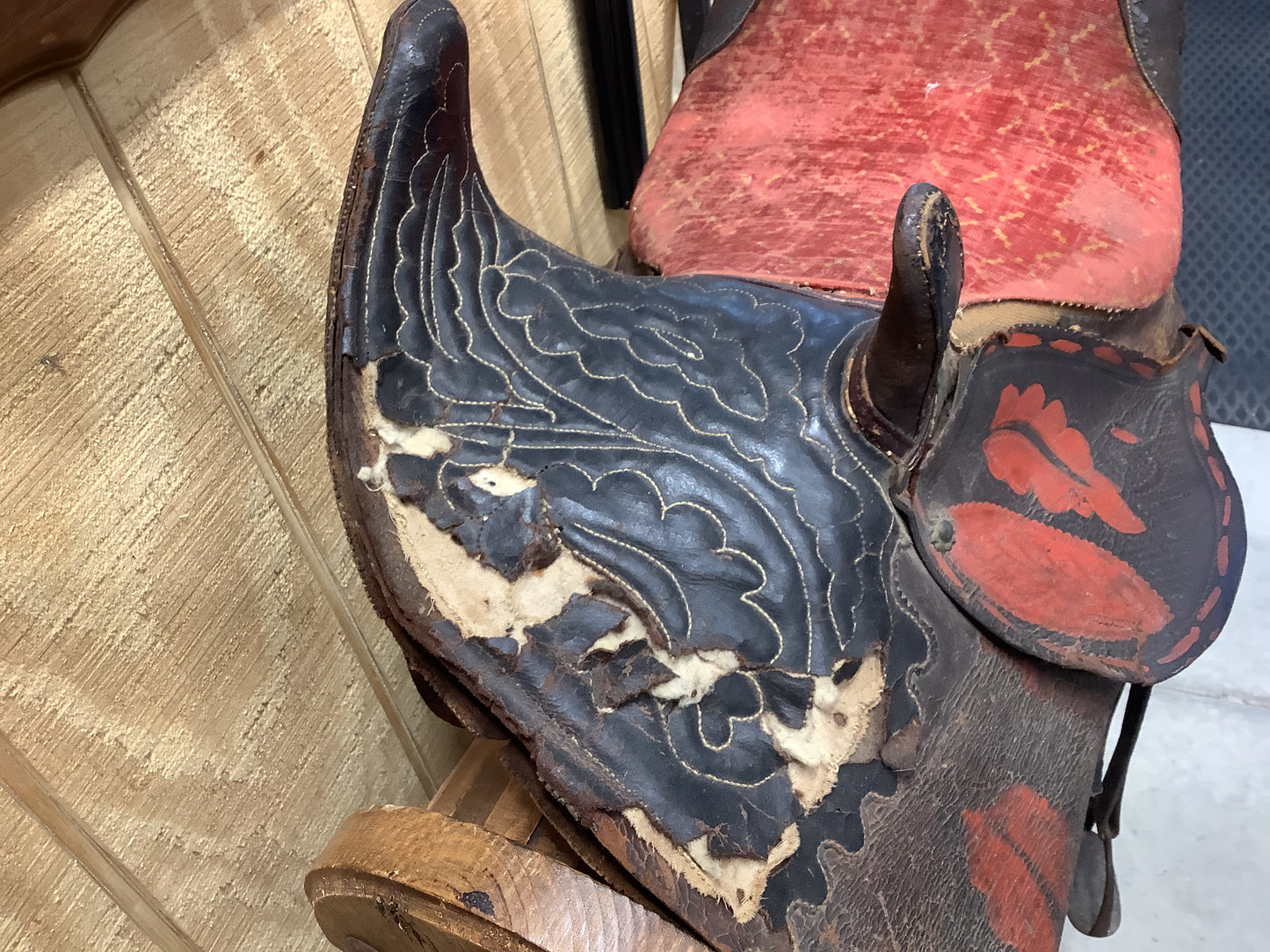 Antique Side Saddle with iron stirrup.