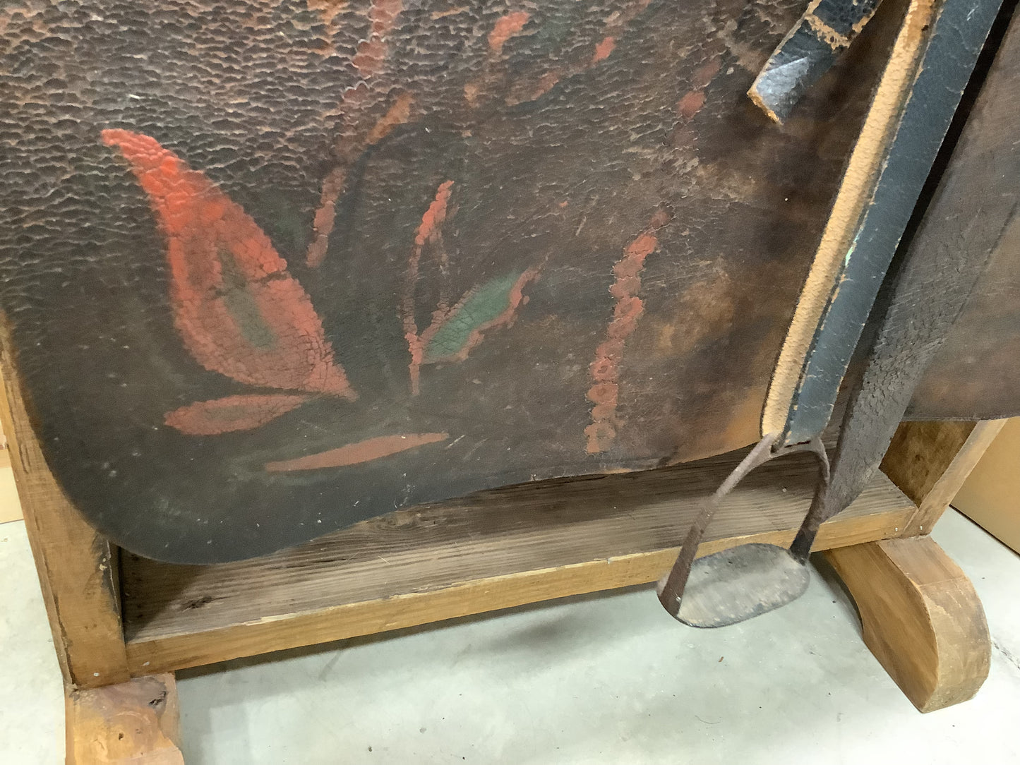 Antique Side Saddle with iron stirrup.