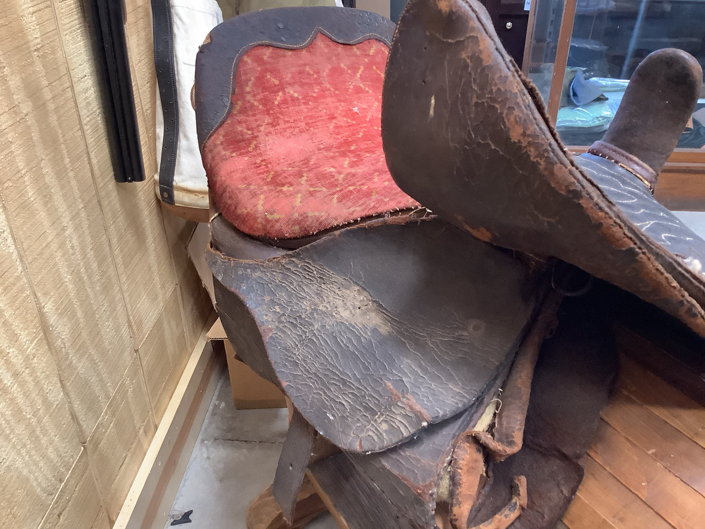 Antique Side Saddle with iron stirrup.