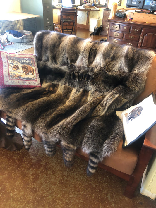 Sue Vinson Furs-hand made raccoon pelt throw/blanket