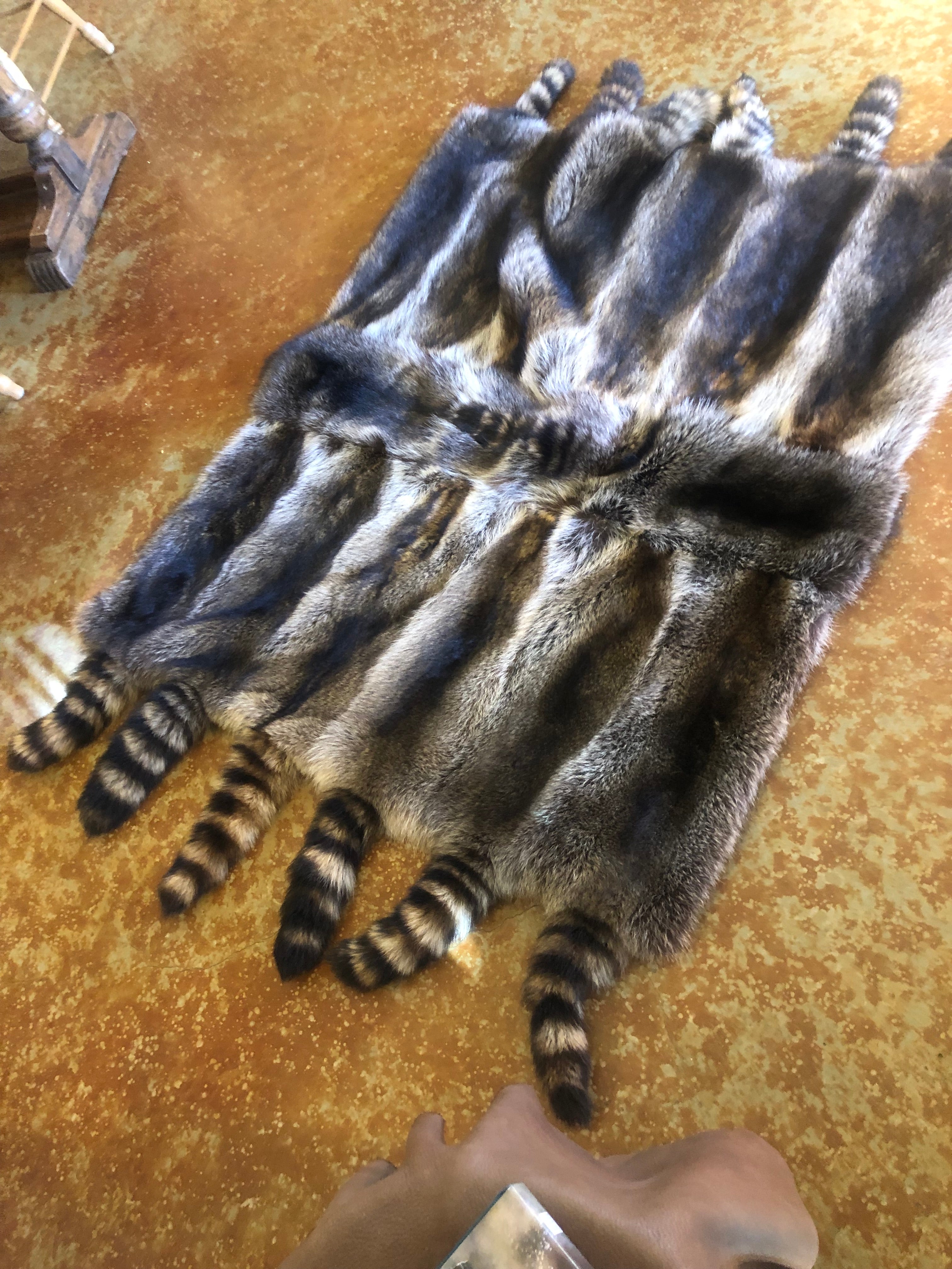 Sue Vinson Furs-hand made raccoon pelt throw/blanket