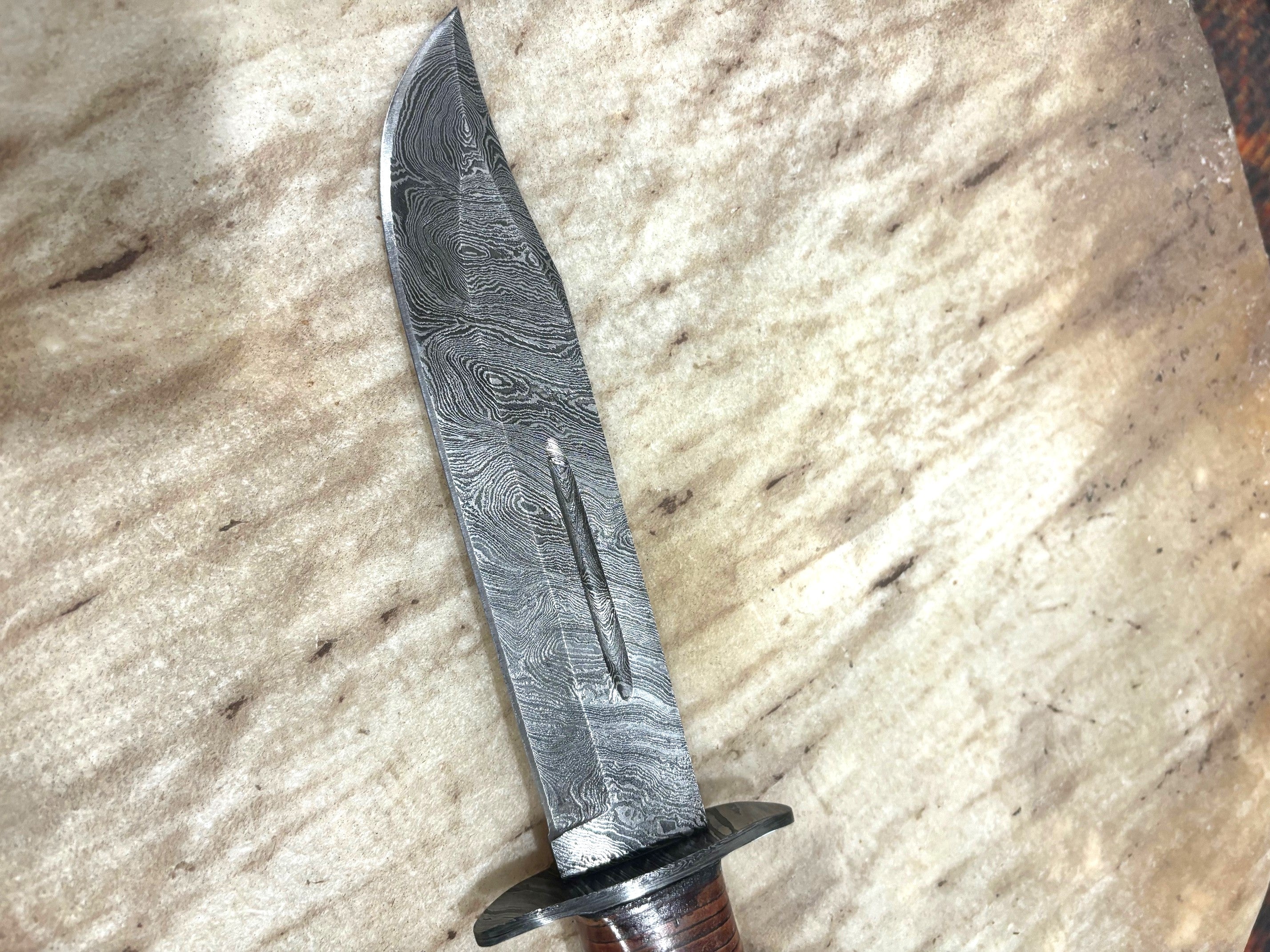 Damascus Steel "Ka-Bar" duplicate with stacked leather handle