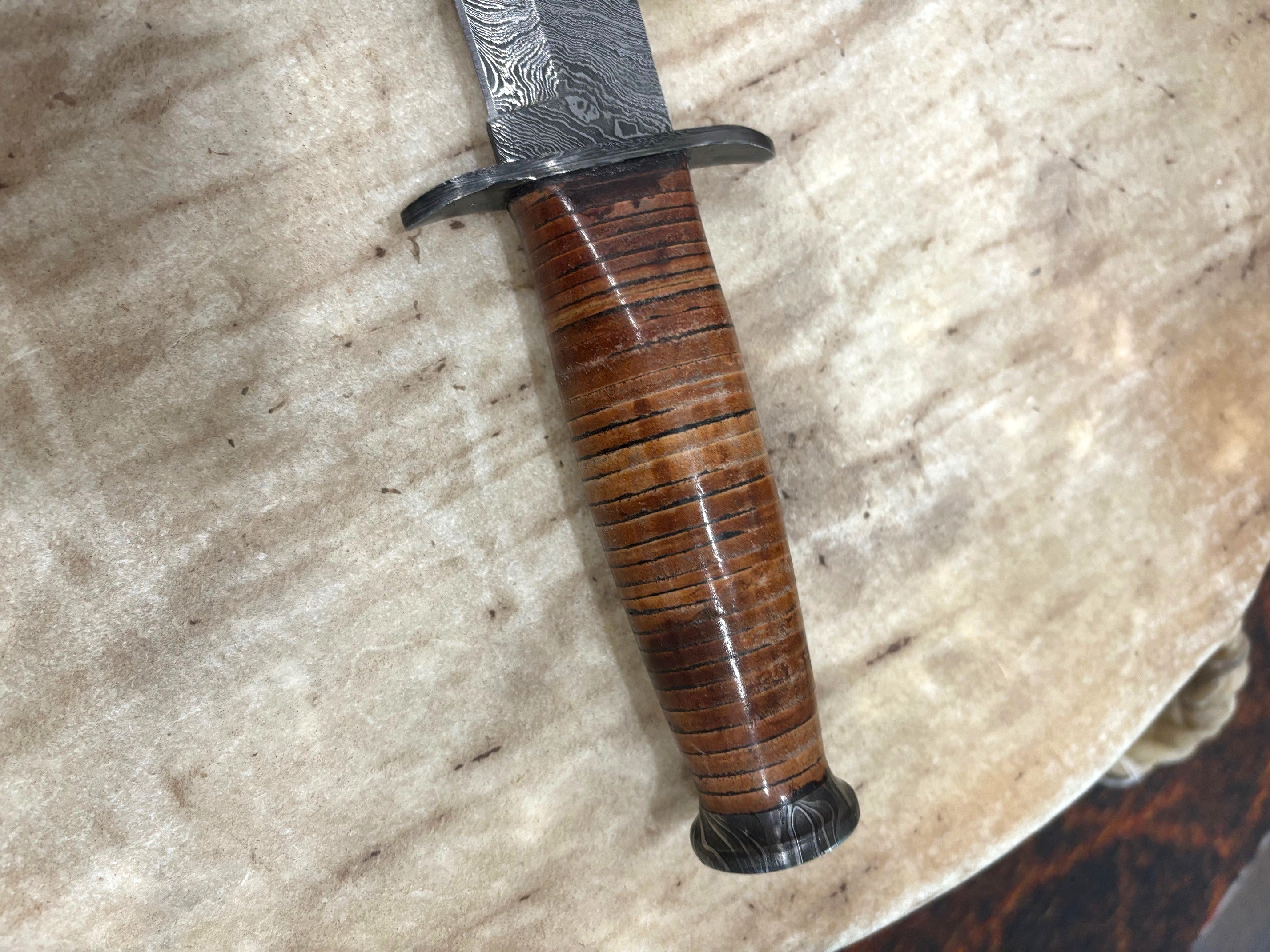 Damascus Steel "Ka-Bar" duplicate with stacked leather handle