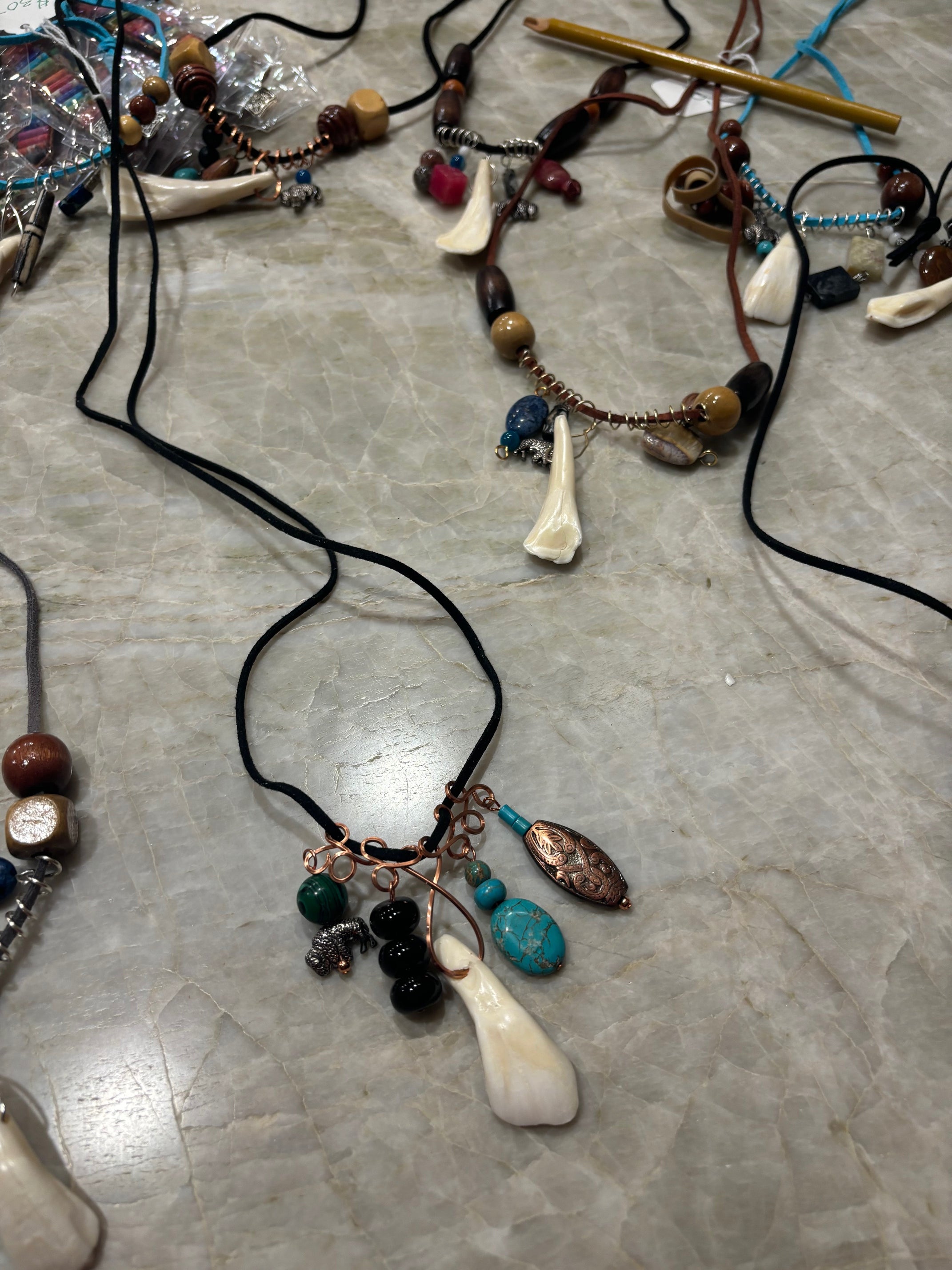 Buffalo Tooth Necklaces with Stones, wooden beads, wire wraps ... and more