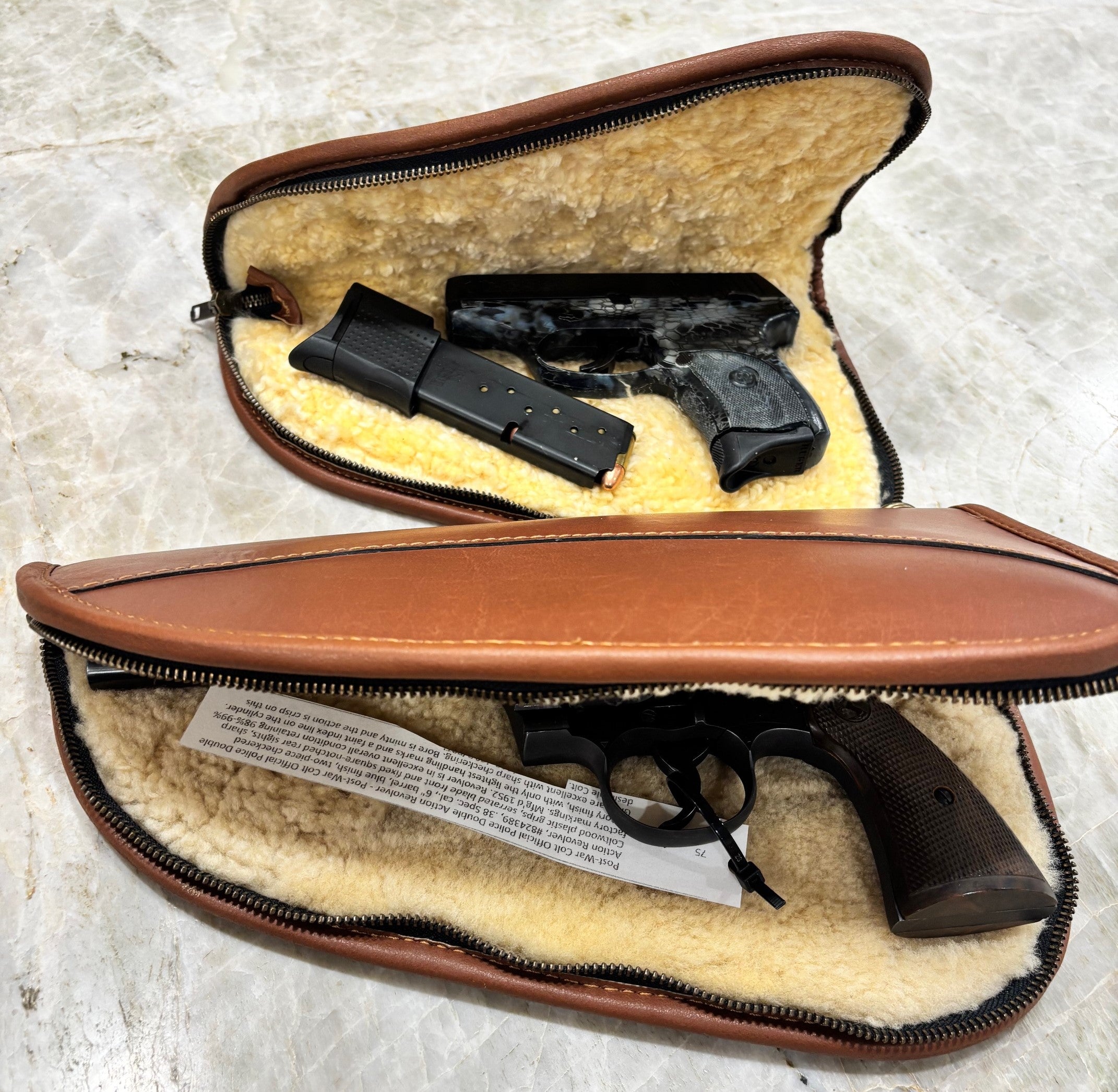 Custom Harness Leather shotgun and pistol cases plus shotgun shell carrier