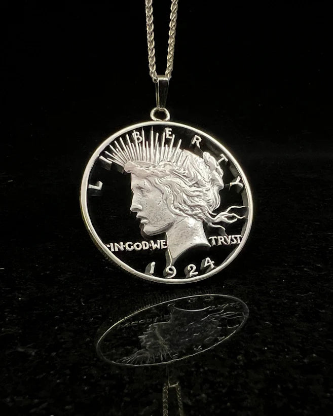 Cut Coin Jewelry from Jarrett Leone in New Hampshire