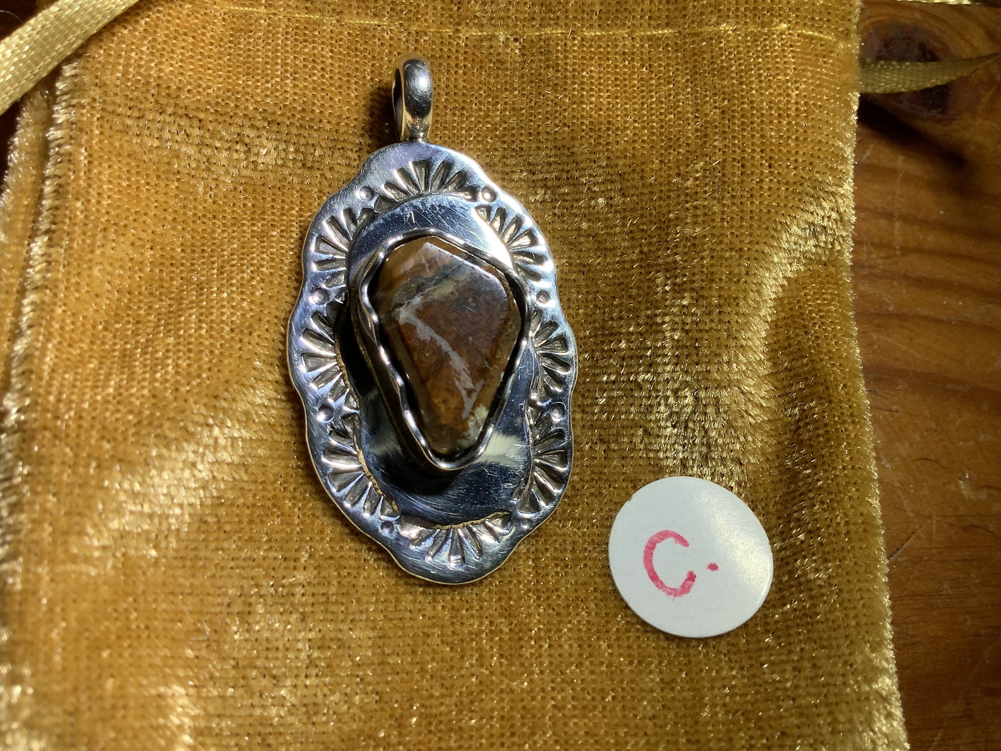 Ronson Page - Hand Made Wooly Mammoth tooth carved gem pendants