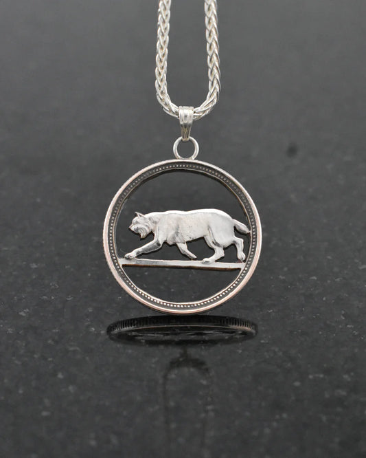 Canada – Lynx coin pendant cut by hand from an actual silver Canadian 25 cent coin. -