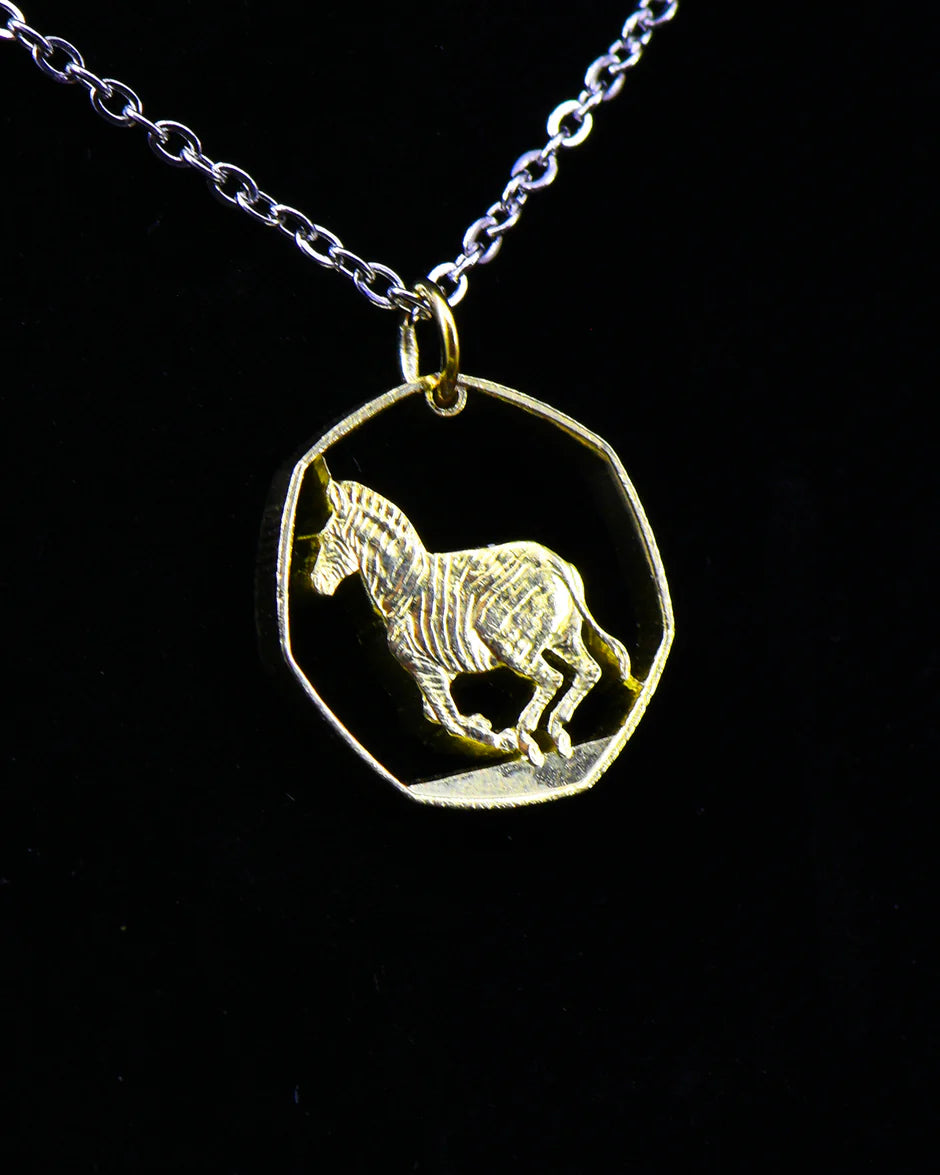 Cut Coin Jewelry from Jarrett Leone in New Hampshire