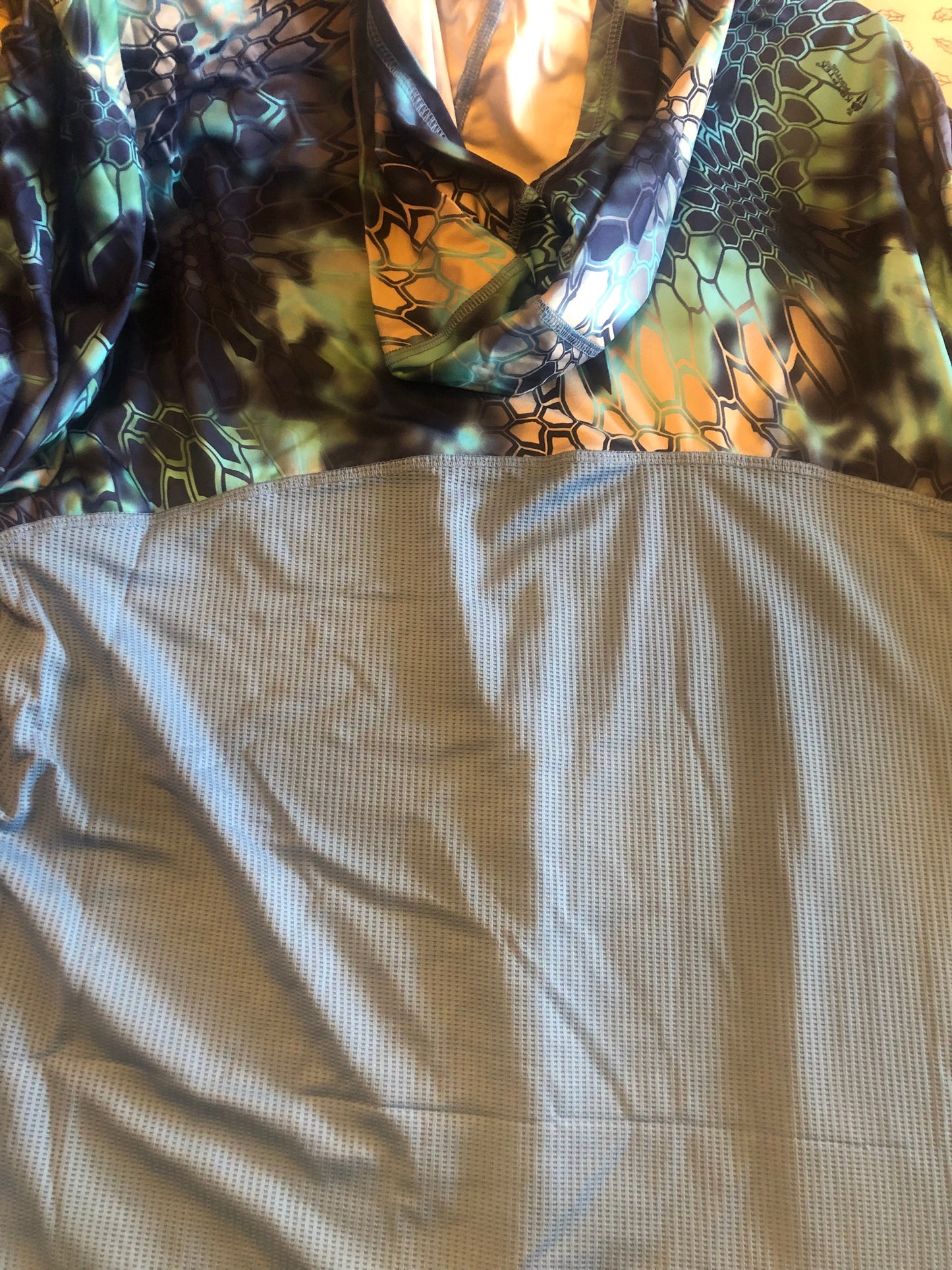 Fin-etic hooded fishing shirt by PARAMOUNT OUTDOOR PRODUCTS