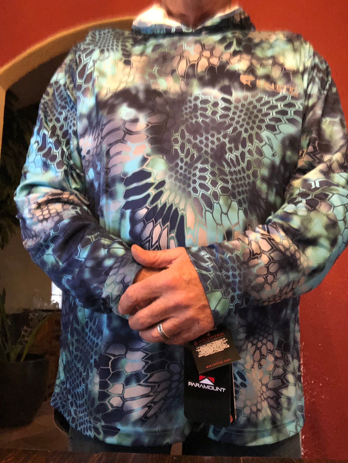 Fin-etic hooded fishing shirt by PARAMOUNT OUTDOOR PRODUCTS