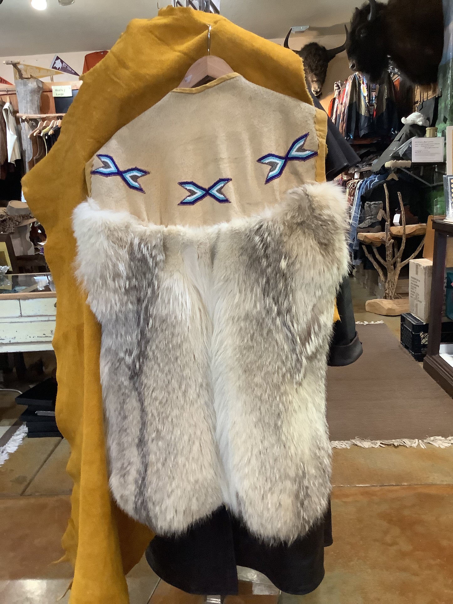 ONE OF A KIND - Vintage Arctic wolf pelt and suede leather; hand made; hand beaded, one-of-a-kind vest