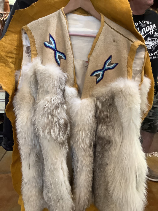 ONE OF A KIND - Vintage Arctic wolf pelt and suede leather; hand made; hand beaded, one-of-a-kind vest