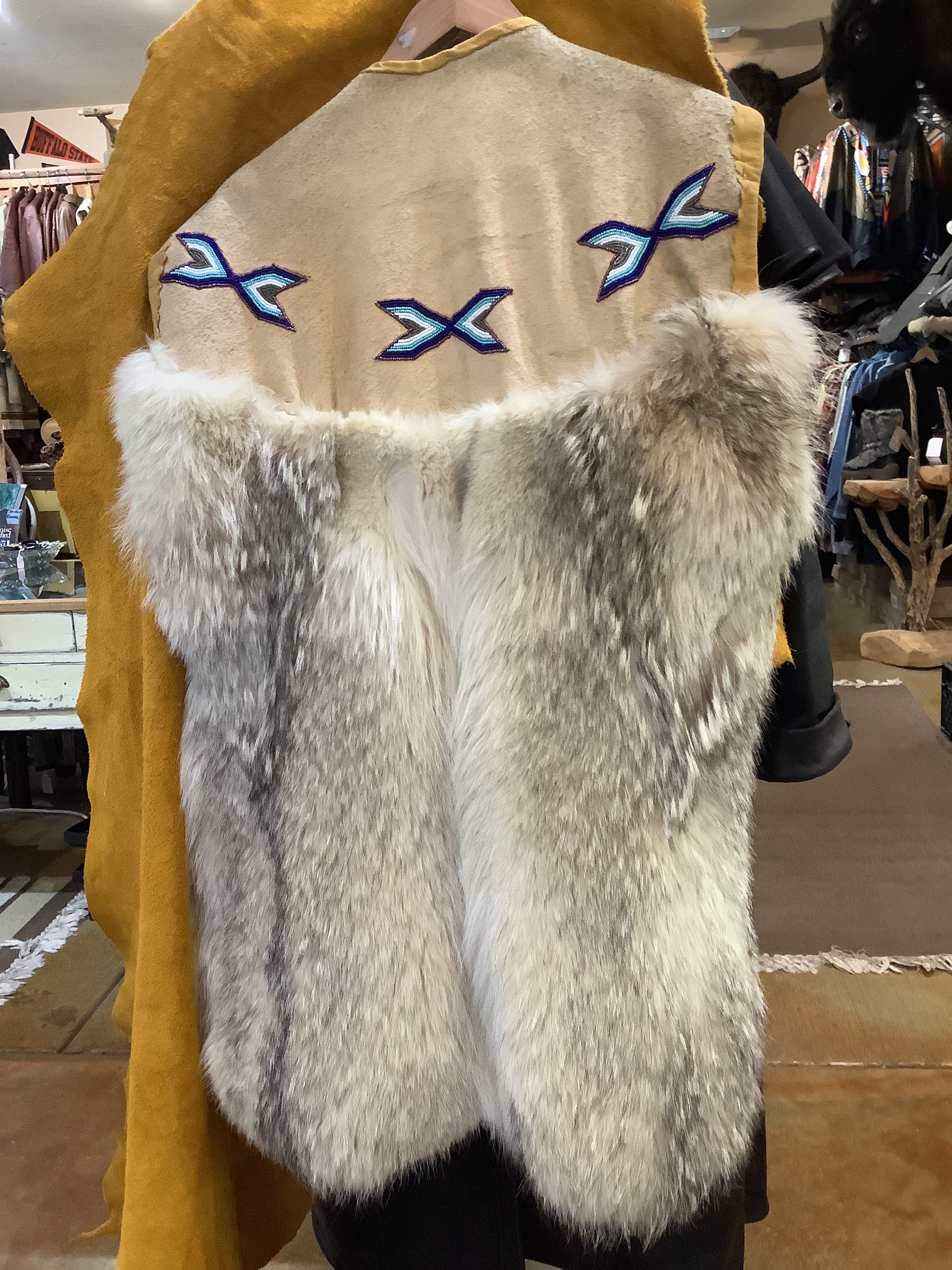 ONE OF A KIND - Vintage Arctic wolf pelt and suede leather; hand made; hand beaded, one-of-a-kind vest