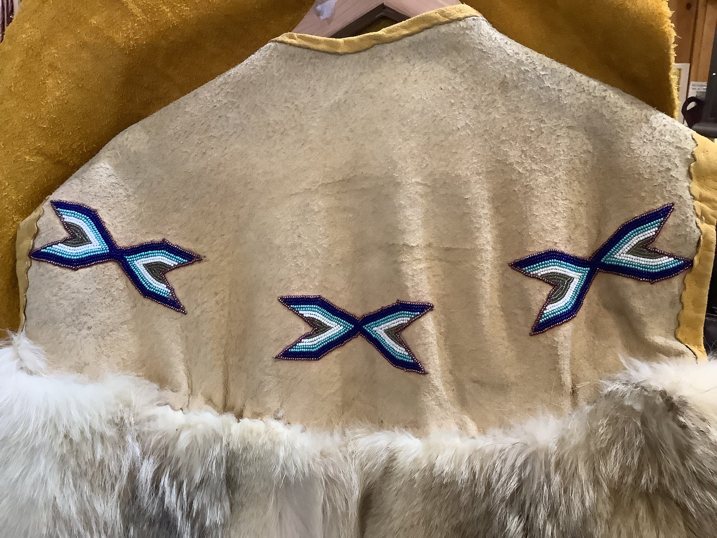 ONE OF A KIND - Vintage Arctic wolf pelt and suede leather; hand made; hand beaded, one-of-a-kind vest